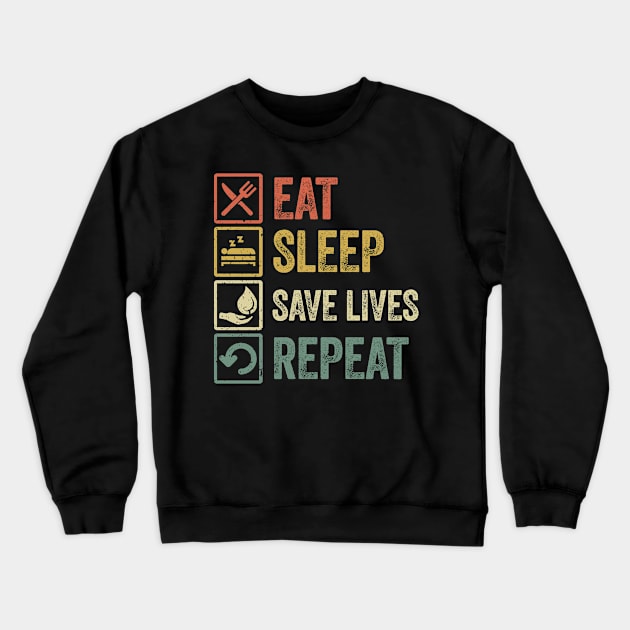 Funny eat sleep save lives repeat retro vintage Crewneck Sweatshirt by Lyume